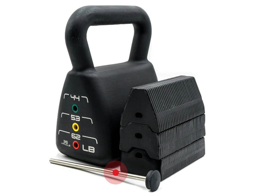 A sealed adjustable kettlebell opened up beside the stack of steel plates that lives inside its shell, with a selector pin