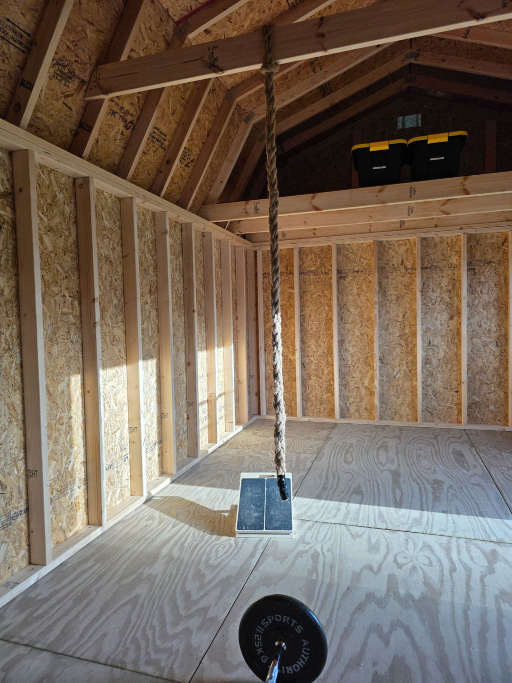 Training rope hung from a ceiling beam