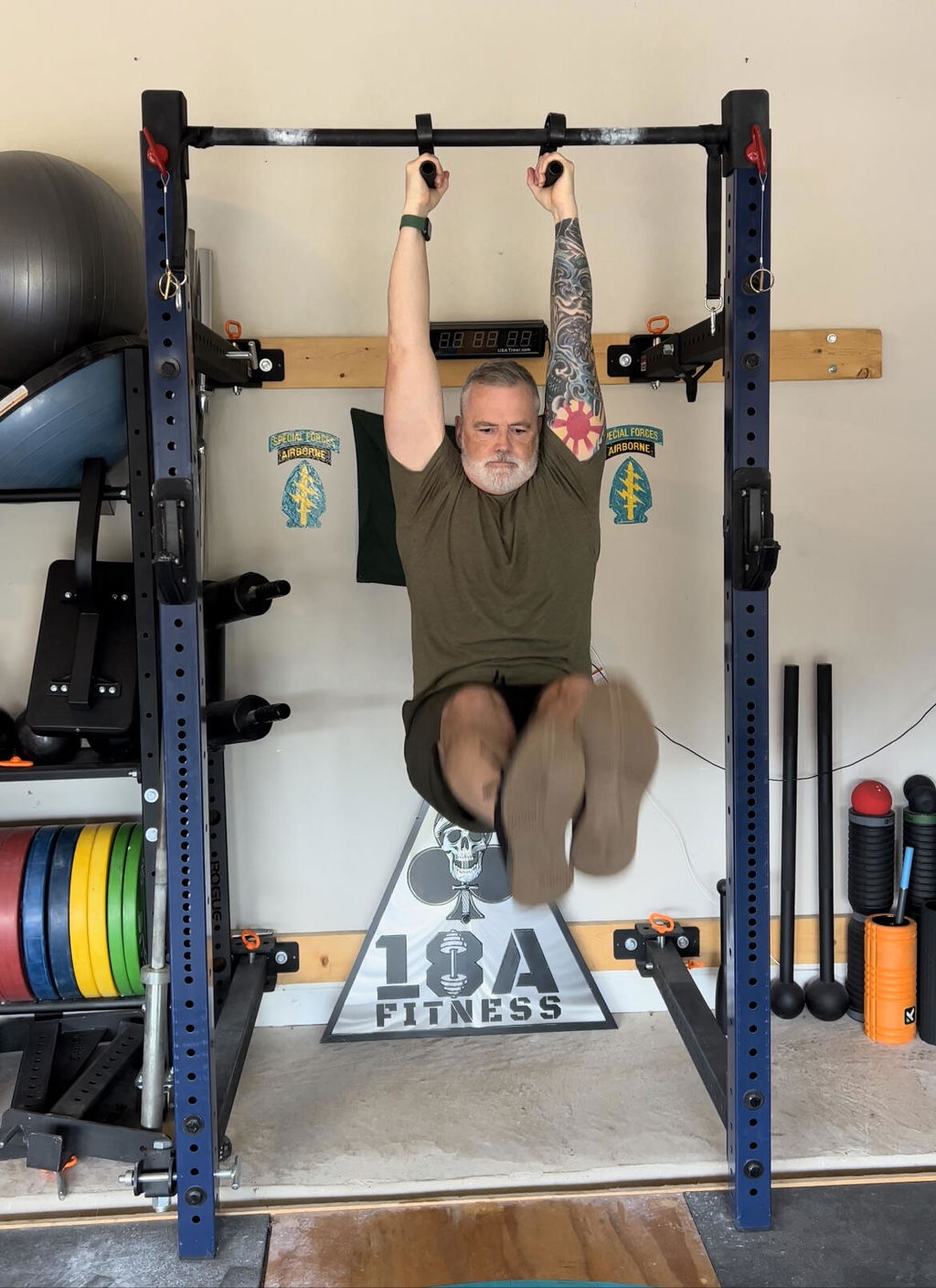 Pull-up performed on neutral-grip handles in a home gym
